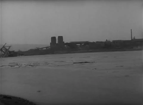 GERMANY - 1945: Bridge Collapse - Shore Survey of the Fallen Span Stock Footage 343942508