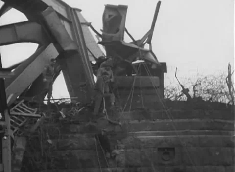 GERMANY - 1945: Bridge Collapse - Torn Girders Enclose the Pier Stock Footage 343942549
