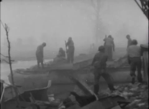 GERMANY - 1945: Bridge construction - Engineers heave treadway girder onto stack 動画素材 344493529