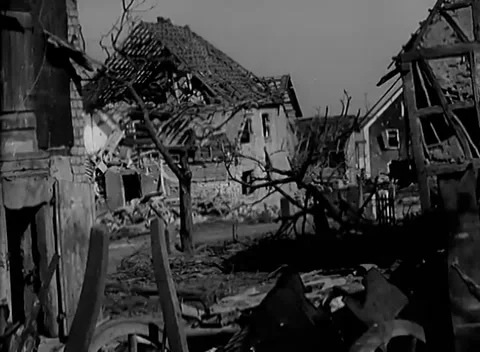GERMANY - 1945: Collapsed rafters - Torn roofs stand above a rubble spill Stock Footage 344599012