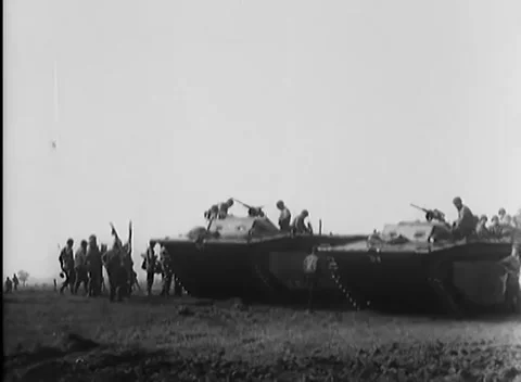 GERMANY - 1945: Crossing force - Two Amphibious Carriers Load Troops Stock Footage 344493958