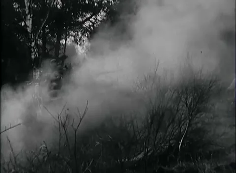 GERMANY - 1945: Gun barrel shape - Tank silhouette in boiling smoke Stock Footage 344598392