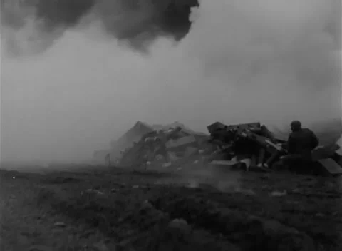 GERMANY - 1945: Launcher drill - Rocket Team Trains Beside Smoke and Wreckage Stock Footage 344492543