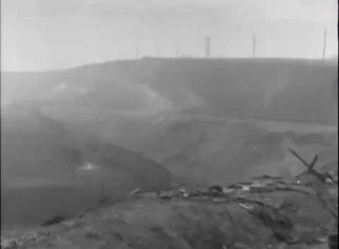 GERMANY - 1945: River assault weapons - Rocket gunner sights across smoky valley Stock Footage 344493488
