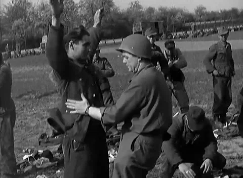 GERMANY - 1945: Ruhr surrender - Confiscated Effects Mark the Processing Line Stock Footage 344493606