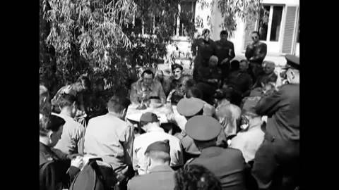 GERMANY - 1945 - A US Army major sits with Hermann Goering at a press conference Stock Footage 254201618