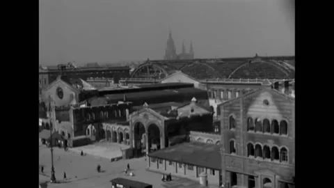 GERMANY - 1946 - Bakers shape dough and put bread into oven in postwar Munich. Stock Footage 296690726