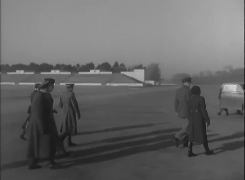 GERMANY - 1946: Occupied Germany press tour - Delegation Departs Parade Ground Stock Footage 343850126