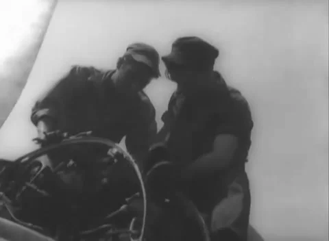 GERMANY - 1948: C-54 maintenance - Repair crews surround a four-engine plane Stock Footage 344496068