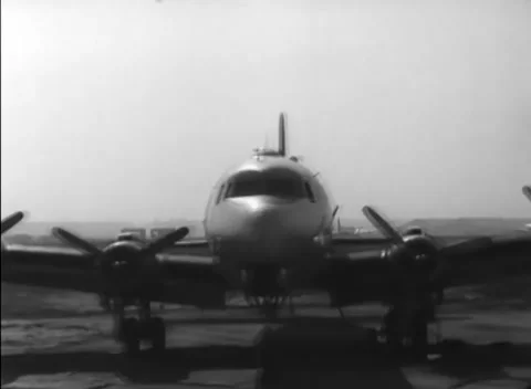 GERMANY - 1948: Head-on aircraft - Large transport runs its engines on the apron Stock Footage 344496276
