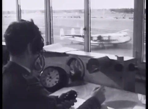 GERMANY - 1949: Airfield cargo work - Radar and cargo crews support flights Stock Footage 344495079