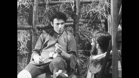 GERMANY - 1961 - Three peasant conscripts question the objectives of the Thirty Stock Footage 323221966