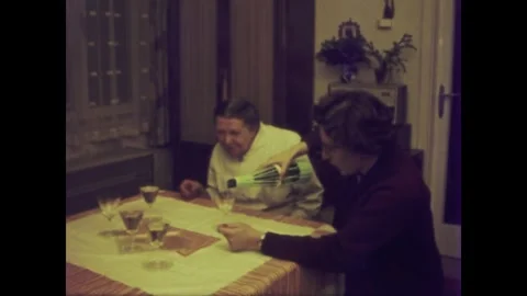 Germany 1965, Elderly People Toasting with Alcohol Bottles at Home, 1970s Stock Footage 265195004