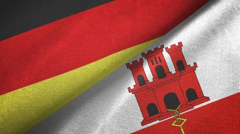 Germany and Gibraltar two flags textile cloth, fabric texture Fotos Stock