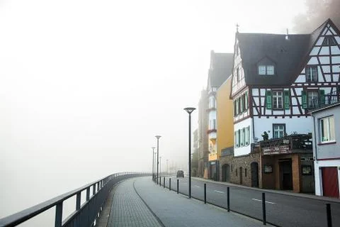 Germany, autumn. City, at home in the morning fog Stock Photos