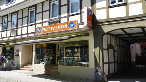 Germany, Bad Gandersheim, Moritzstrasse, May 28, 2023, historic camera shop  .. Stock Footage 268054091