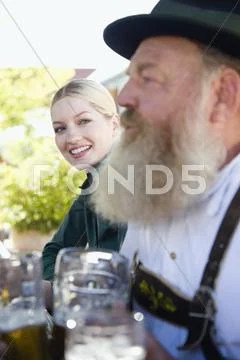 Germany, Bavaria, Upper Bavaria, People in beer garden Stock Photos