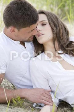 Germany, Bavaria, Young Couple Falling In Love, Close Up