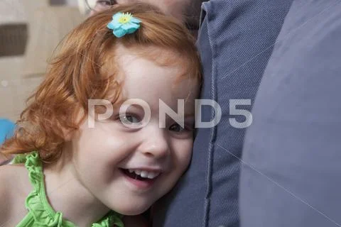 Germany, Berlin, Girl having at home Stock Photos