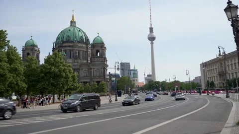 Germany, Berlin, June 2, 2026. Berlin Cathedral and TV Tower Street Traffic Stock Footage 336267223