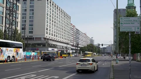 Germany, Berlin, June 2, 2026. Berlin City Intersection with Tram Bus and Road Stock Footage 336269023