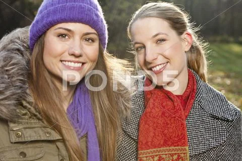 Germany, Berlin, Wandlitz, Friends smiling, portrait Stock Photos