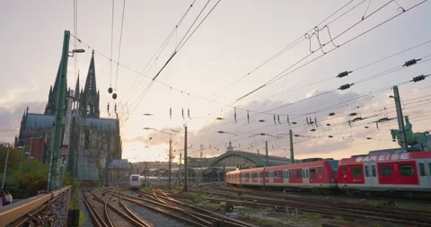 Germany city of Cologne view of a passenger train leaving the station against Stock Footage 250174459
