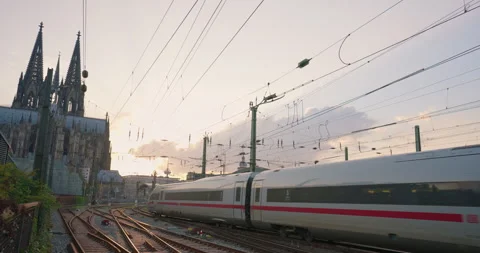 Germany city of Cologne view of a passenger train arriving at the station Stock Footage 250335731