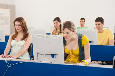 Germany, Emmering, Students using computer in computer lab 写真素材
