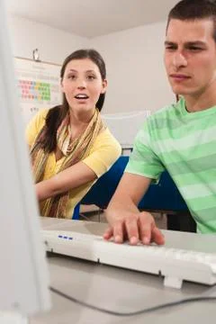 Germany, Emmering, Students using computer in computer lab Stock Photos