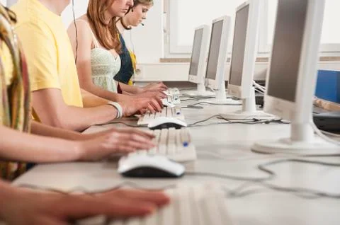 Germany, Emmering, Students using computer in computer lab Stock Photos