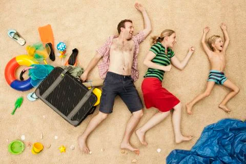 Germany, Family with toys and baggage at beach Stock Photos