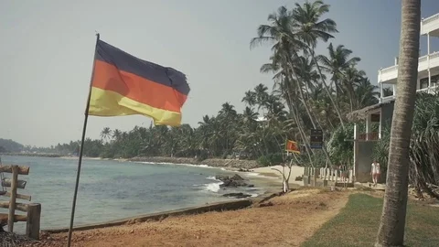 Germany Flag on beach background near ocean 스톡 동영상 73288120