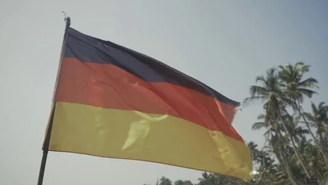 Germany Flag on beach background near ocean Video stock 73288123