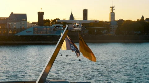 Germany Flag Blowing In The Wind With River Rhein In The Background Stock Footage 96240137