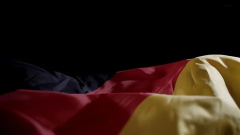 Germany flag waving on black background with copyspace, slow motion Stock Footage 112255624
