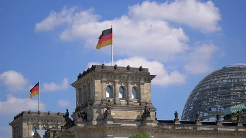 Germany Flags And The Dome of The Reichstag Building in Berlin Stock Footage 109537245