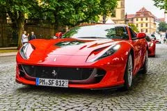 Maranello, Italy - April 01, 2023: luxury stylish Ferrari red supercar on  dark background Stock Photo - Alamy