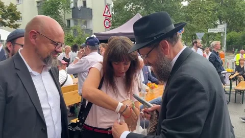 Germany: Germany: Chabad Berlin Marks 30 Years With Street Festival and P... Stock Footage 345120483