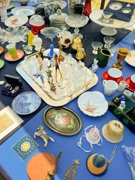 GERMANY - JUN 03, 2023: Assorted Glass Figurines, Plates, Mugs, Ceramics, a.. Stock Photos