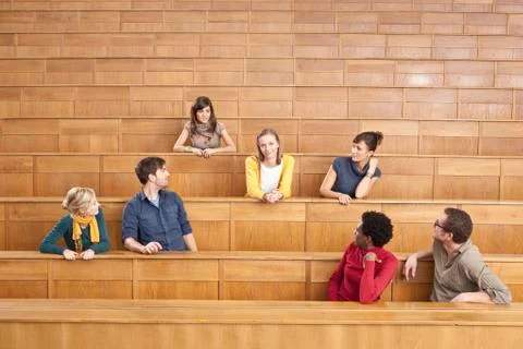 Germany, Leipzig, Group of university students sitting together in classroom Stock Photos