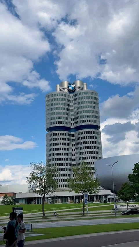 Germany, Munich, 06 August 2025: Exploring the Iconic BMW Headquarters in Munich Stock Footage 314493218