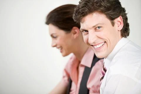 Germany, Munich, Co-workers smiling, portrait Stock Photos