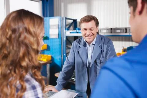 Germany, Neukirch, Apprentice and instructor Stock Photos