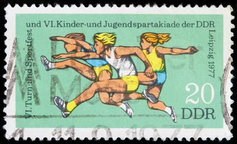 Germany postage stamp Germany postage stamp close-up over black background... Fotos Stock