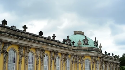 GERMANY POTSDAM Left view facade of summer palace Sanssouci on cloudy sky Stock Footage 127154284