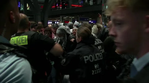 Germany: Pro-Palestine Protesters Stage Flash Mob at Berlin Train Station Stock Footage 282951320