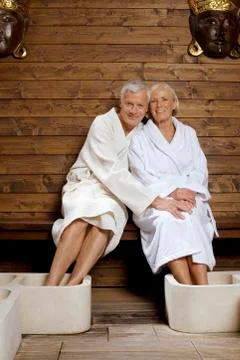 Germany, senior couple wearing bath robes Stock Photos