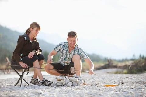 Germany, Upper Bavaria, Couple preparing food Fotos Stock