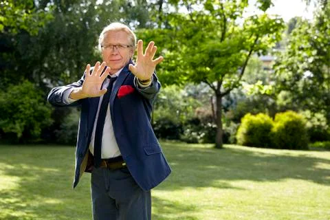Gesticulate man in the garden Stock Photos